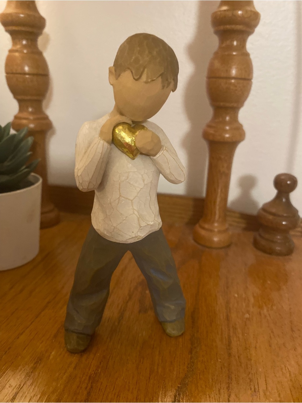 Willow Tree Decorative Figurine of a little boy holding a Golden Heart
